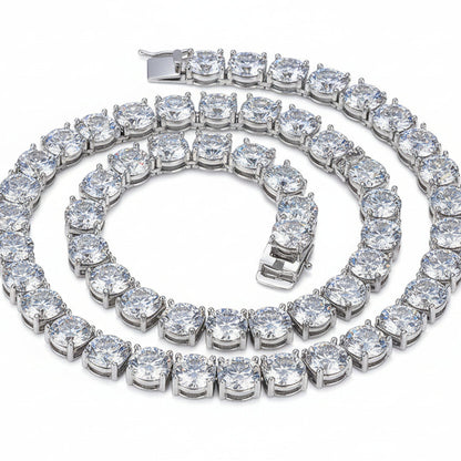 Silver bracelet with large clear gemstones on a black background