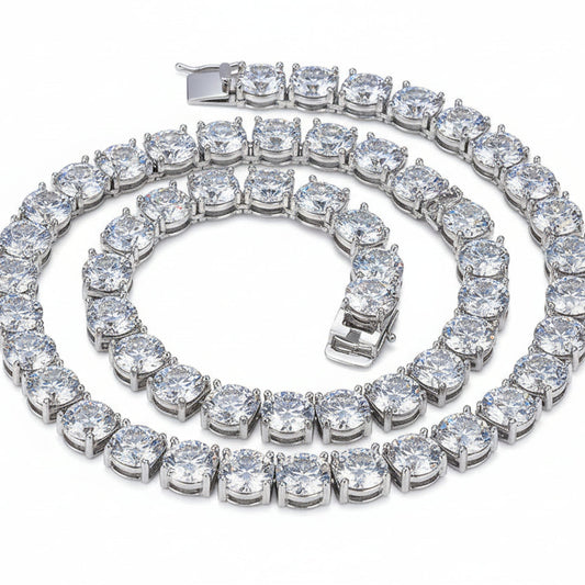 Silver bracelet with large clear gemstones on a black background