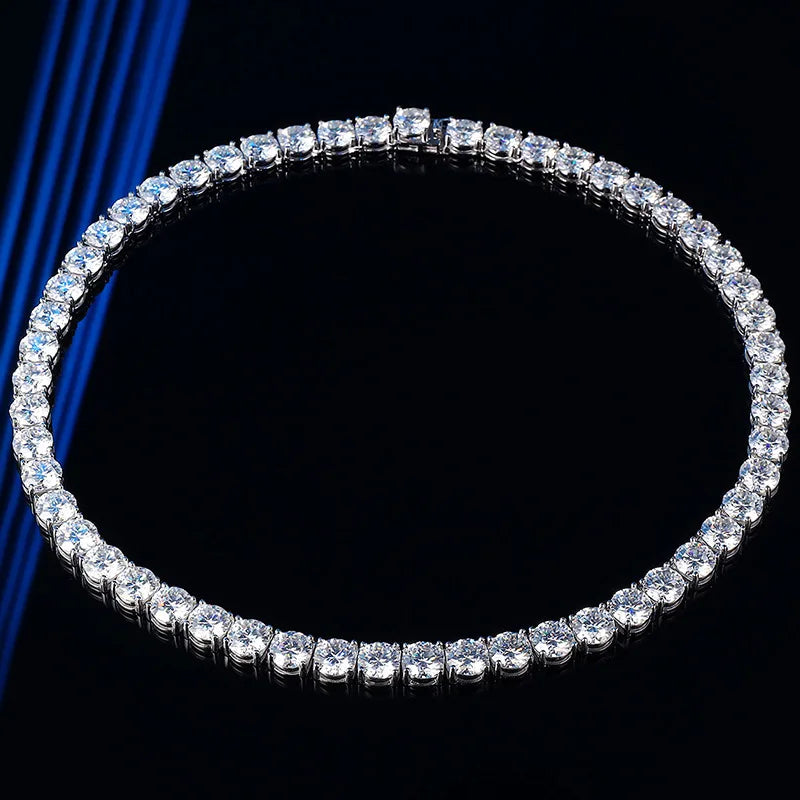 Silver bracelet with clear stones on a black background