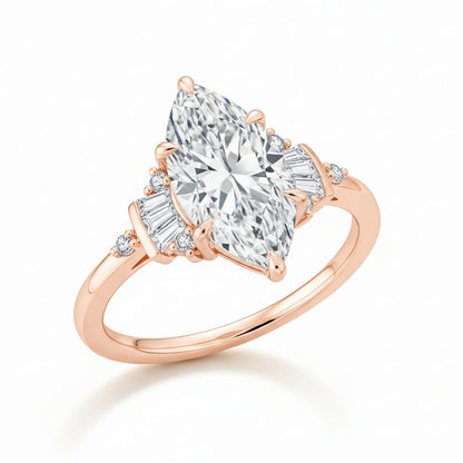 Rose gold ring with a large diamond and smaller diamonds on a light background