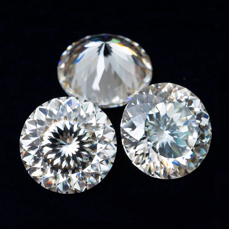 Three round diamonds on a black background