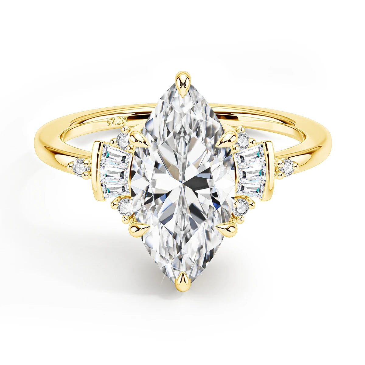 Gold ring with a large pear-shaped diamond and smaller side stones on a white background