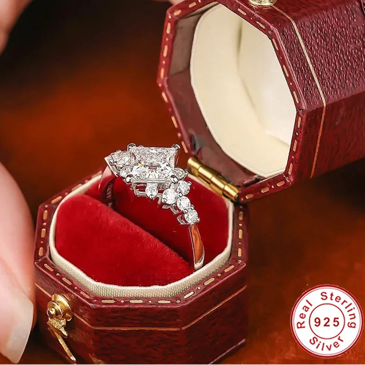Diamond ring in a red jewelry box