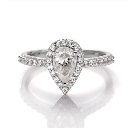 Shop Moissanite Engagement Rings. 1.0 Carat. Pear Cut.