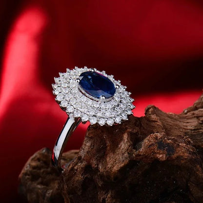 Oval Shaped Natural Sapphire and Diamond Rings. 18K White Gold.