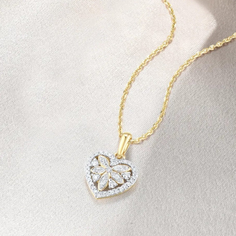 Heart Shaped Diamond Pendant. 14K Yellow Gold.