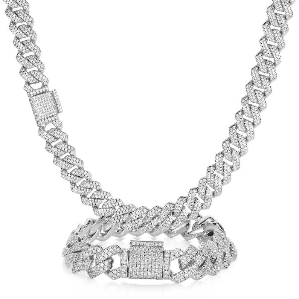 Silver chain necklace with diamond-like stones on a white background