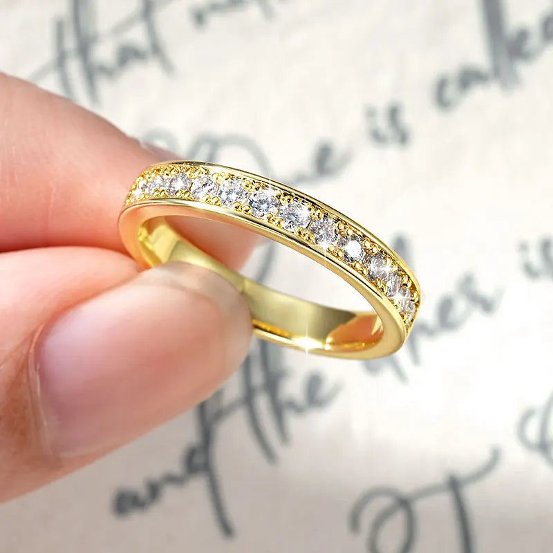 Minimal half eternity moissanite ring in 14K gold filled finish, featuring small 2mm stones with refined shine.