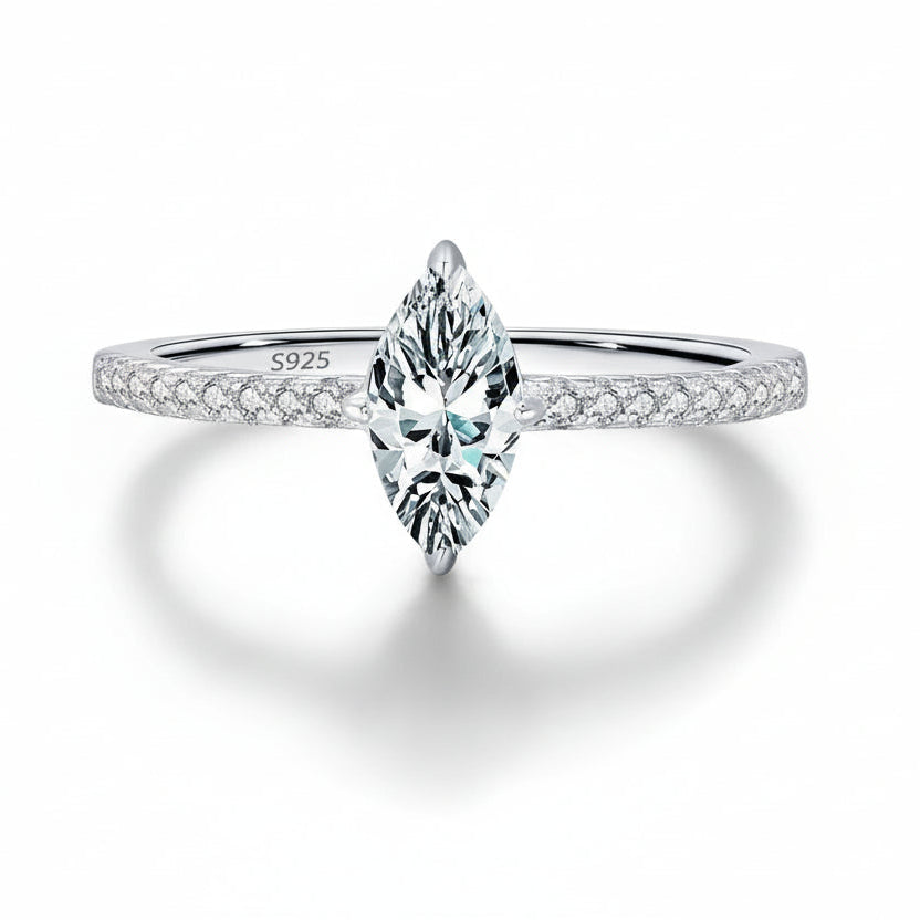 Silver ring with diamond on a white background