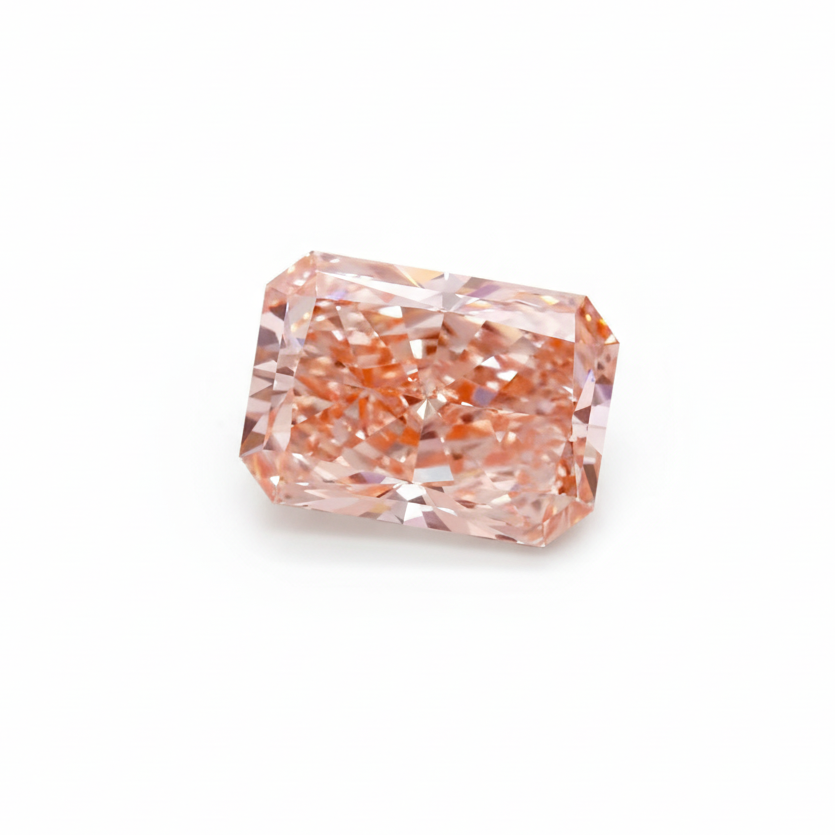 Pink diamond with IGI certificate and text indicating engraved number and IGI certification.