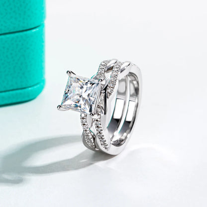 Silver ring with a large diamond and smaller diamonds 