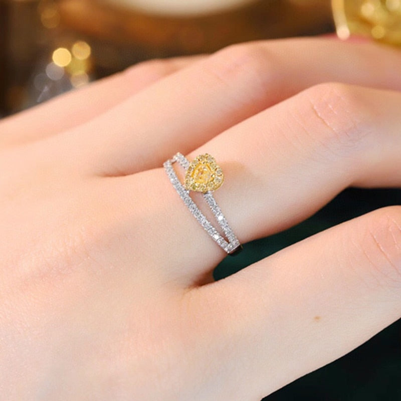 Heart Shape. Yellow and White Natural Diamond Rings.