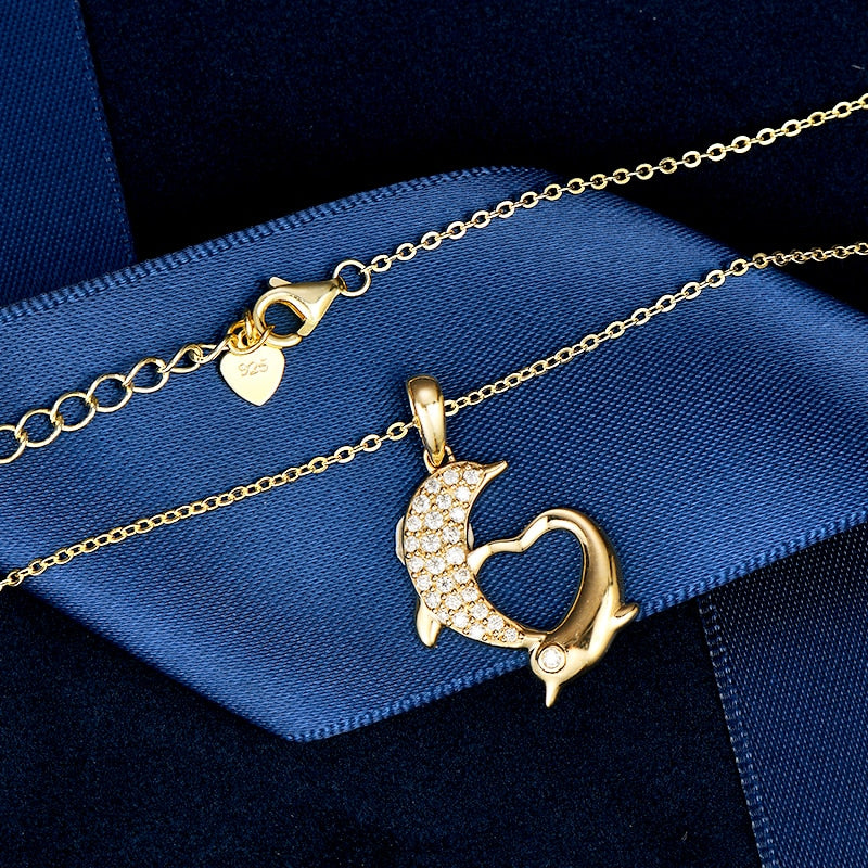 Dolphin-shaped Pendant Necklaces. Moissanite Gemstones D VVS1. 10K Gold.