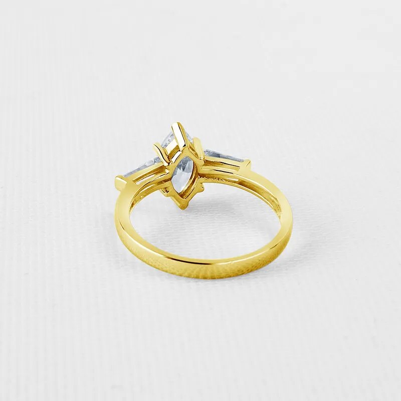 Marquise-Cut. Gold Moissanite Three-Stone Engagement Rings. 1.0 Carat. D VVS1.