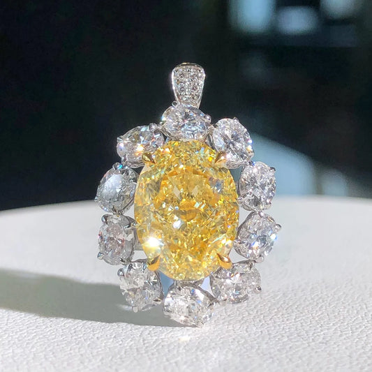 Luxury Diamond Engagement Rings. 5.06 Carat Fancy Yellow Diamond.