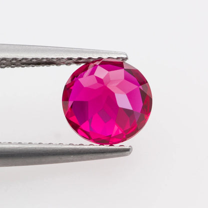 Lab-Grown Ruby, Sapphire Gemstones. Vivid Red And Vivid Blue. Round Cut.