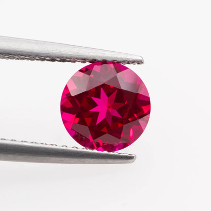 Lab-Grown Ruby, Sapphire Gemstones. Vivid Red And Vivid Blue. Round Cut.