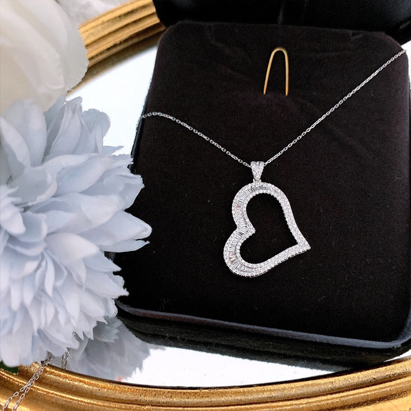 Heart-Shaped Diamond Pendant Necklaces. 0.65 Carat Natural Diamonds.