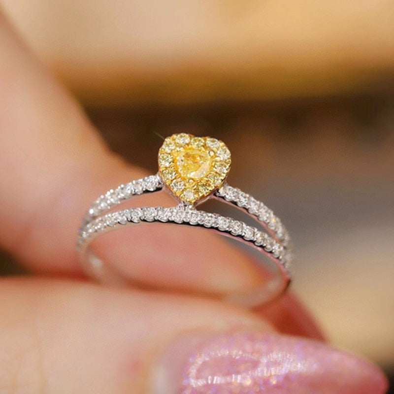 Heart Shape. Yellow and White Natural Diamond Rings.