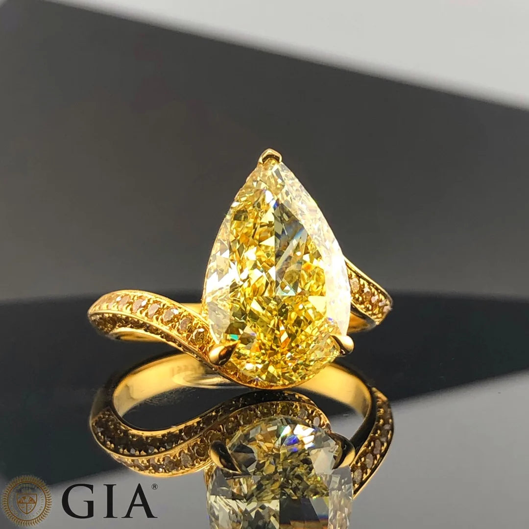 Luxury Diamond Engagement Rings. 5.23 Carat Fancy Yellow Diamond.