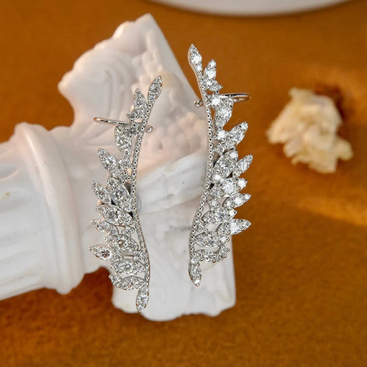 Real Diamonds. 0.86 Carat. Luxury Wing Shape Stud Earrings.