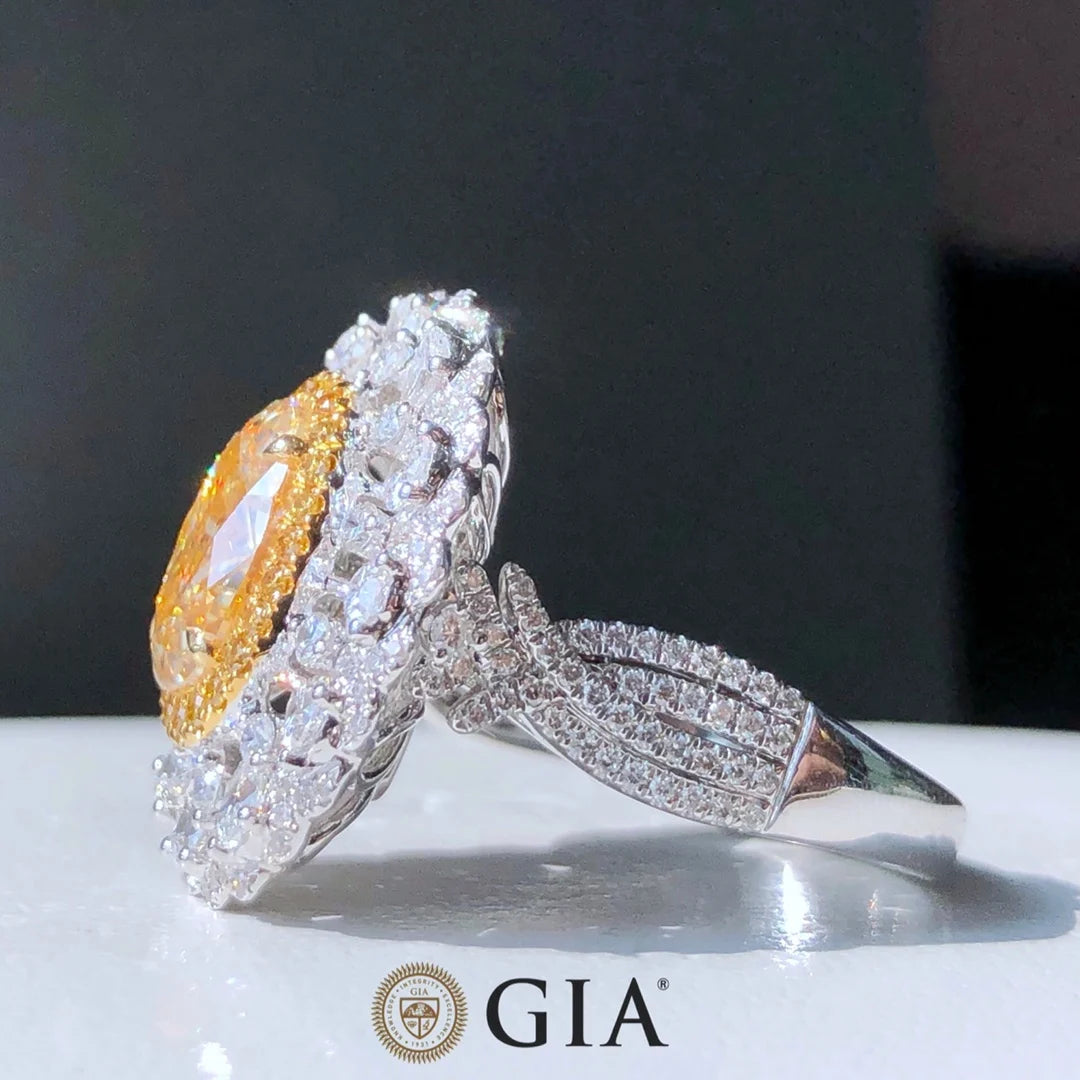 Luxury Diamond Engagement Rings. 2.56 Carat Fancy Yellow Color.