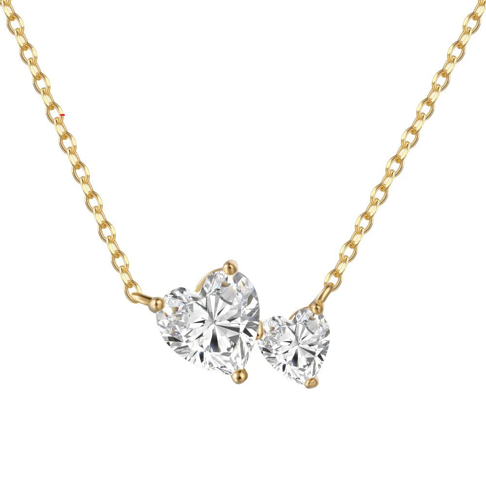 Gold necklace with heart-shaped crystals and specifications on a white background