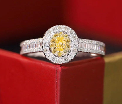 Oval Shape Diamond Rings. Yellow and White Diamond Engagement Rings.