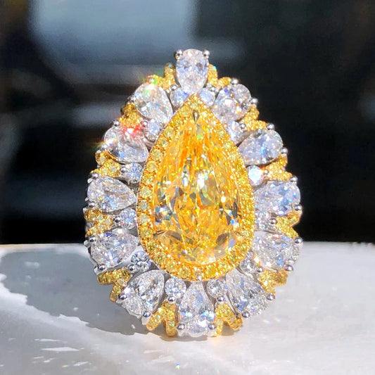 Luxury Diamond Engagement Rings. 5.07 Carat Fancy Yellow Diamond.