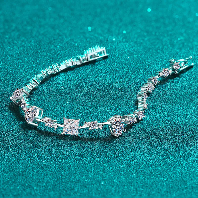 Elegant Multi-shaped Stones Moissanite Bracelets. Total 6.43 Carat. D VVS1.