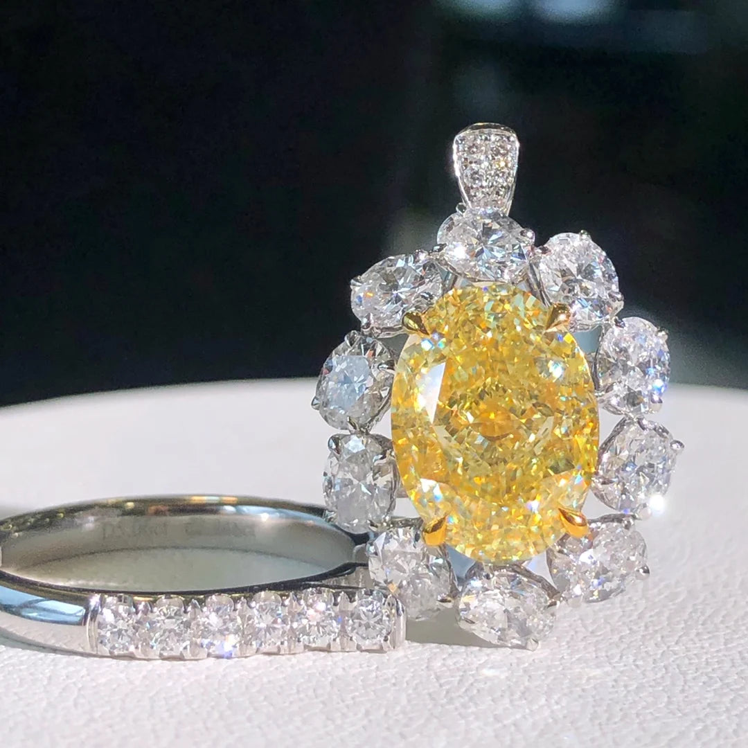 Luxury Diamond Engagement Rings. 5.06 Carat Fancy Yellow Diamond.