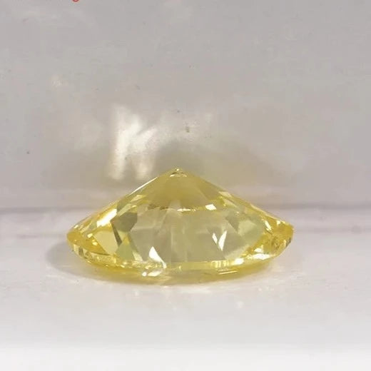 Loose Diamond. Fancy Vivid Yellow Color. 0.50 Carat Oval Shape diamond.