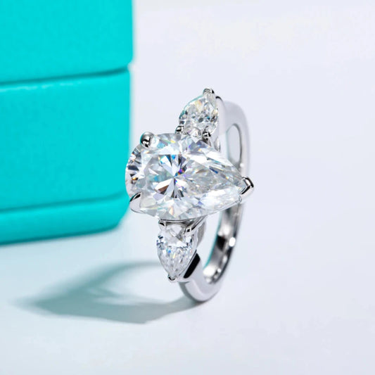 6.0 Carat D Color Pear Moissanite 3-Stone Engagement Ring.