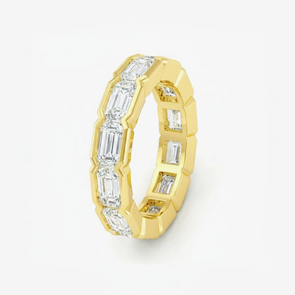 Gold ring with baguette-cut gemstones on a white background, labeled '925 Silver + Full Moissanite' and 'yellow gold'.