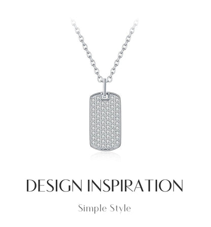 Silver necklace with a dog tag pendant on a white background