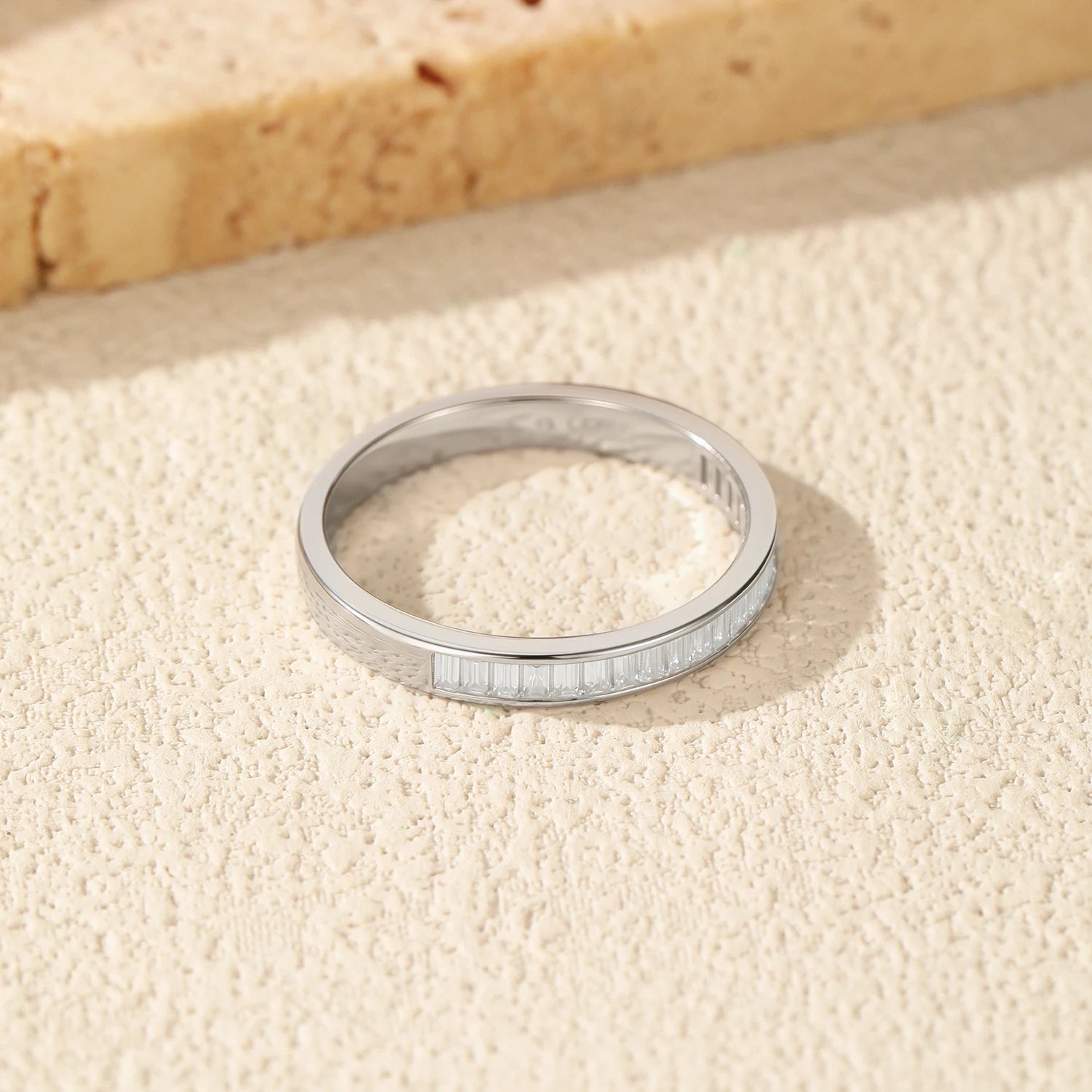 VK Diamonds stackable eternity rings with emerald cut moissanite