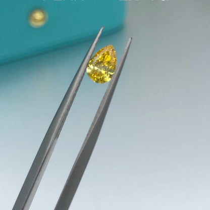 Pear Shape. Yellow Diamond. 0.44 Carat. Lab-Grown Diamond.