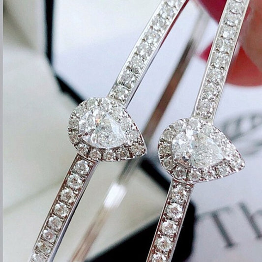 Elegant Diamond Bangle. 1.10 Carat Natural Diamonds. 18K White Gold.
