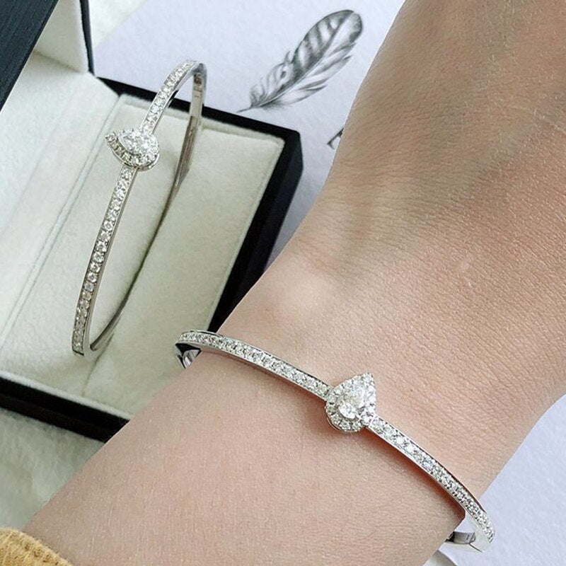 Elegant Diamond Bangle. 1.10 Carat Natural Diamonds. 18K White Gold.