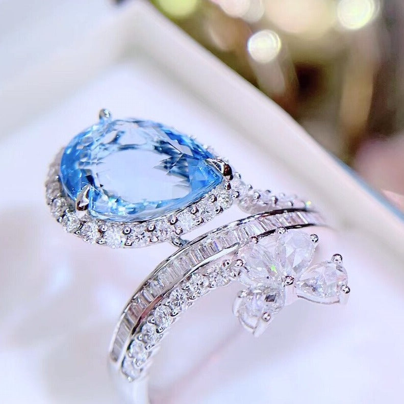 Blue Aquamarine and Natural Diamond Rings. 18K White Gold.
