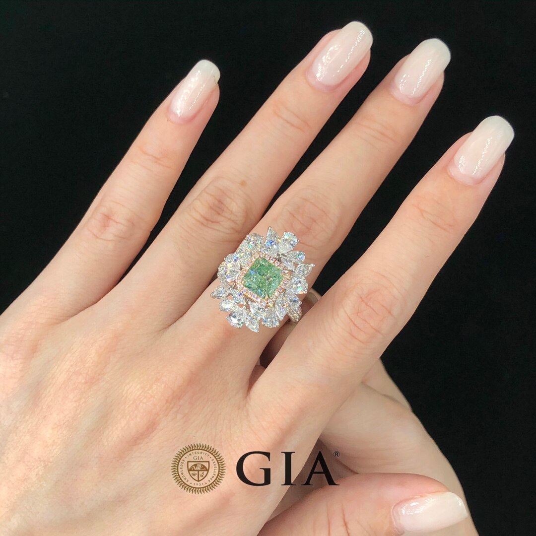 Fancy Light Green Diamond Engagement Rings. Luxury Diamond Jewelry.