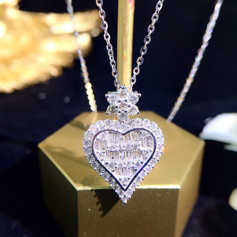 Heart Shaped Diamond Pendant Necklace. 0.45 Carat. 18K White Gold.