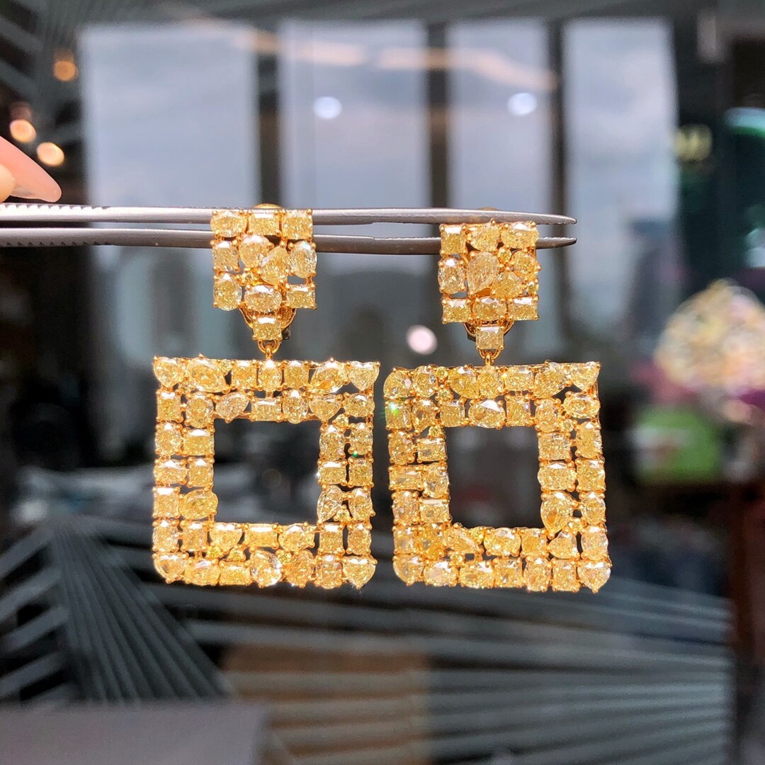 Luxury 11.26 Carat Yellow Diamond Earrings.