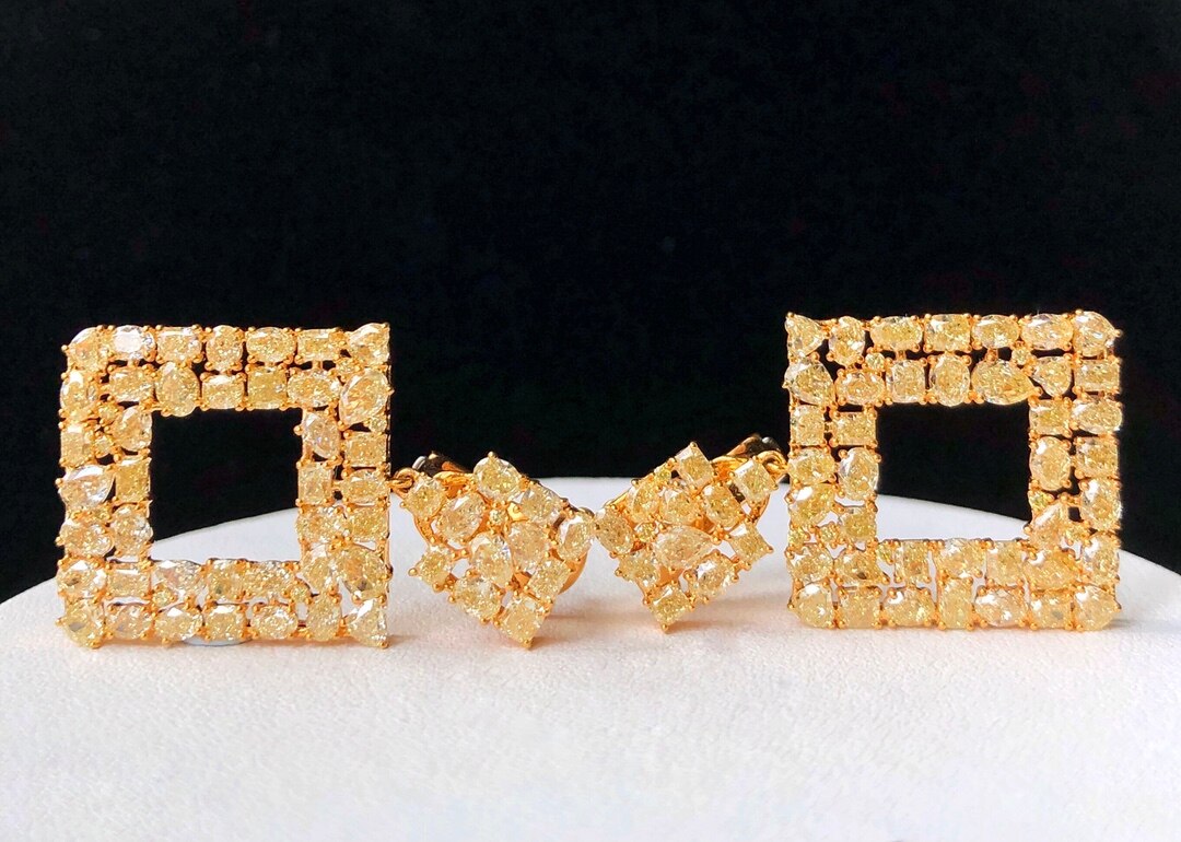 Luxury 11.26 Carat Yellow Diamond Earrings.