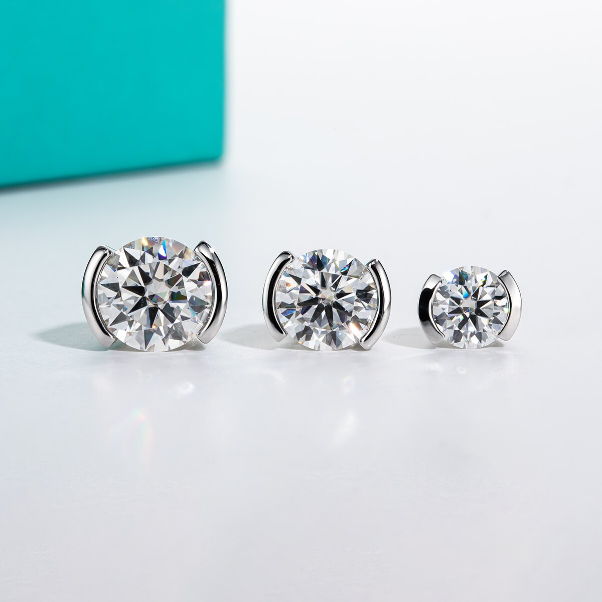 Moissanite Stud Earrings. 1.0 - 2.0 Carat. D VVS1. 18K Gold Plated Silver.