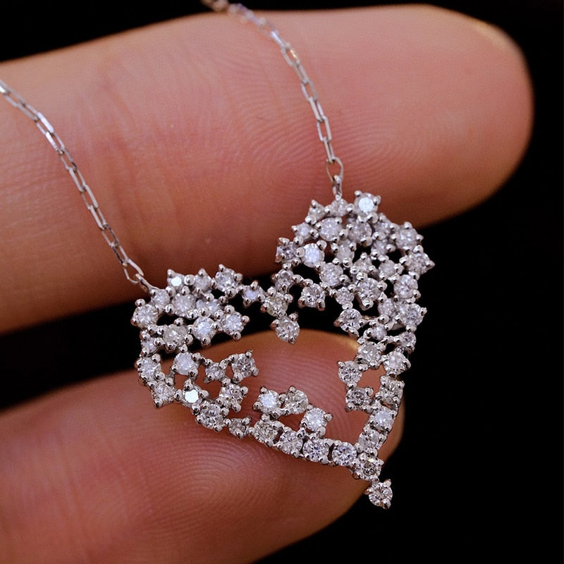 Heart Shaped Diamond Pendant Necklace. 0.70 Carat Natural Diamonds.