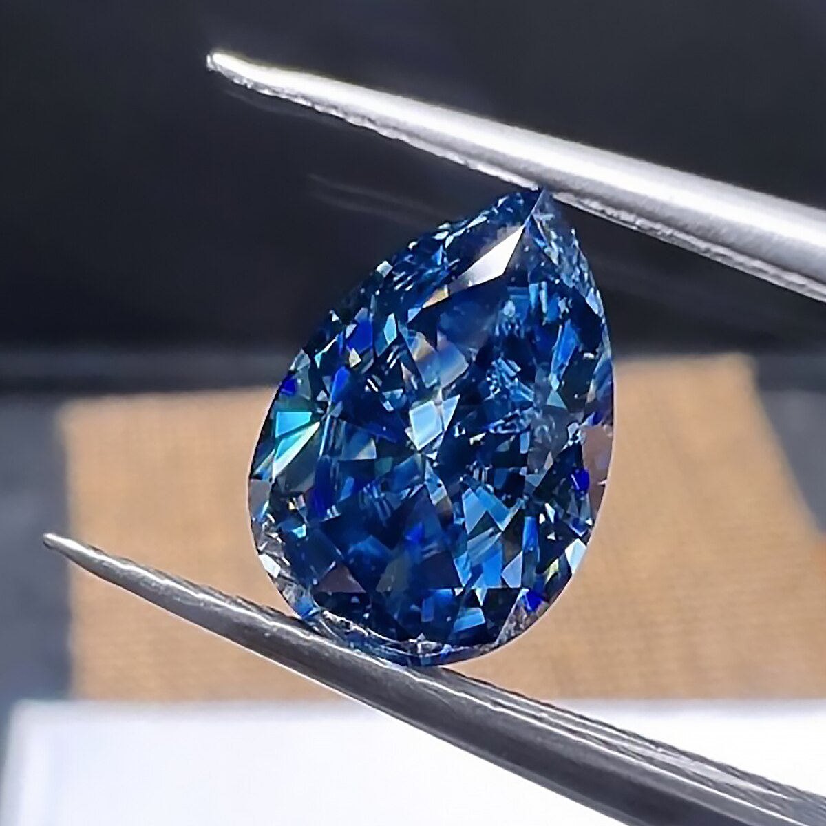 Blue Color. Moissanite Gemstone. Teardrop Shape. From 0.35 to 13.0 Carat.
